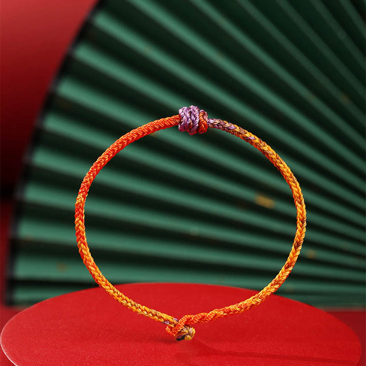 Pulsera de cuerda trenzada roja de oro púrpura colorida hecha a mano con Buddha Stones