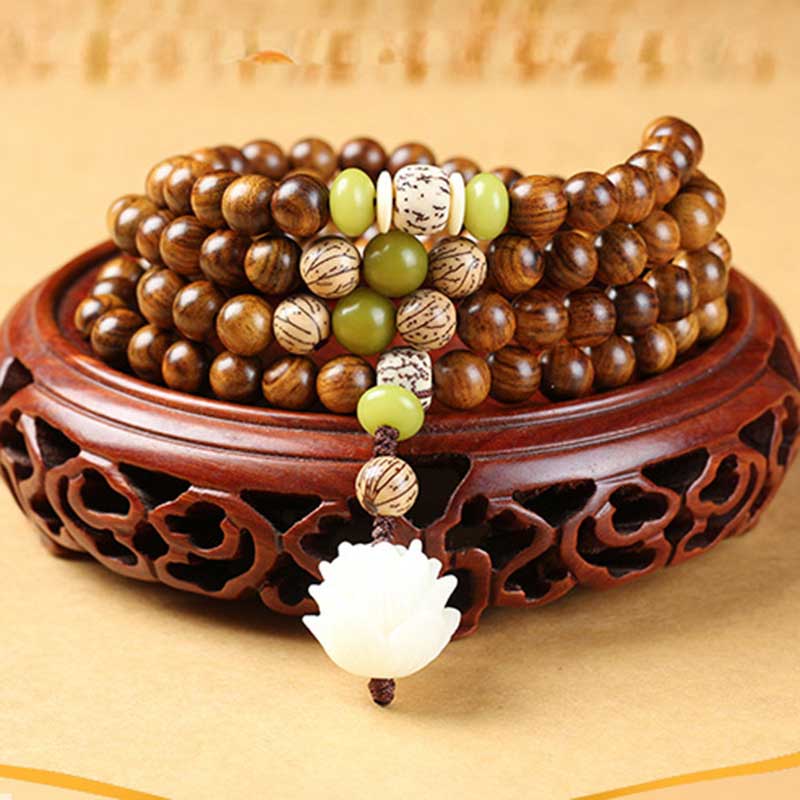 Buddha Stones Palo de rosa tibetano Loto Mala Protección Calma Collar Pulsera