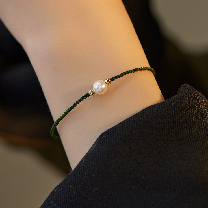 Pulsera de hilo trenzado de la suerte con cuentas de perlas naturales de piedras de Buddha Stones
