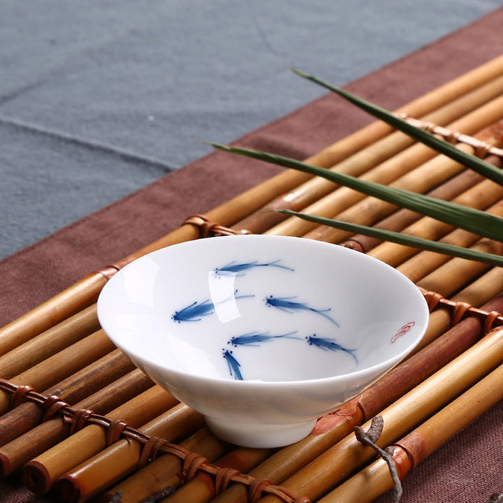 Buddha Stones Jingdezhen, porcelana azul y blanca, pez Koi, taza de té de cerámica, tazas de té de Kung Fu