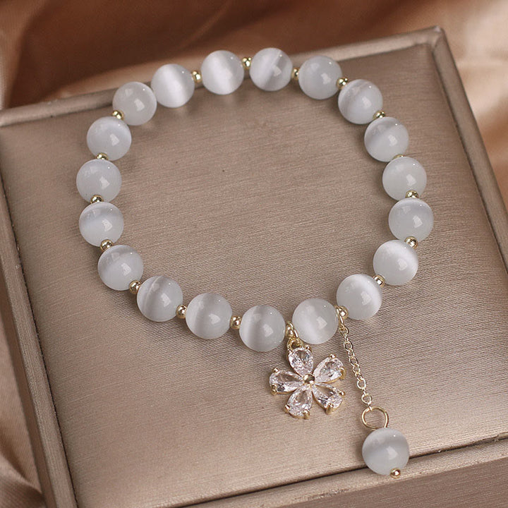 Pulsera de apoyo a la paz con dije de flor de ojo de gato y Buddha Stones