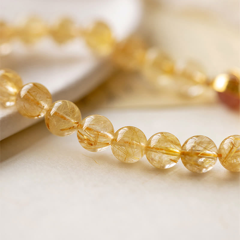 Pulsera de protección de estrella de cuarzo fresa de cuarzo rutilado dorado con Buddha Stones