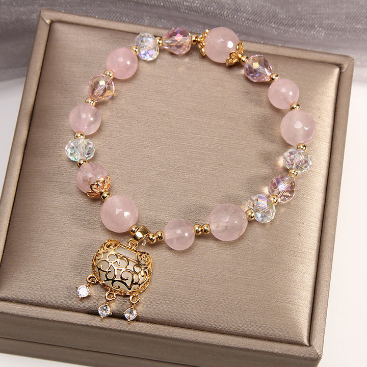 Pulsera de protección calmante de cristal rosa natural con Buddha Stones