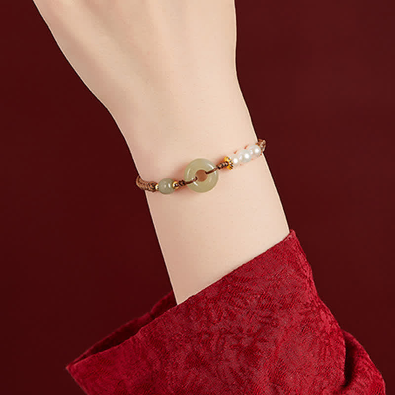 Pulsera de la suerte con hebilla de la paz y perlas de jade hetiano natural de Buddha Stones