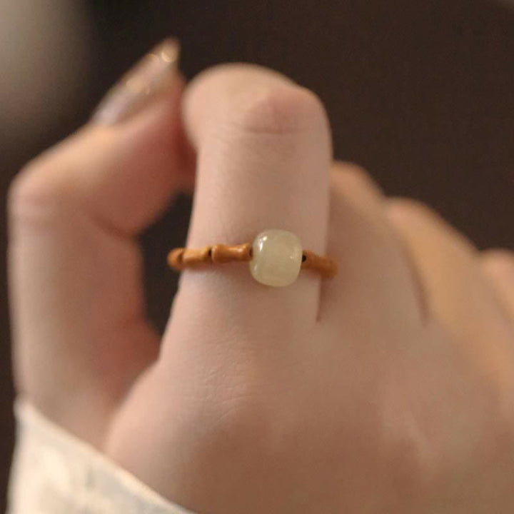 Anillo de suerte de prosperidad de bambú con cuentas de jade hetiano