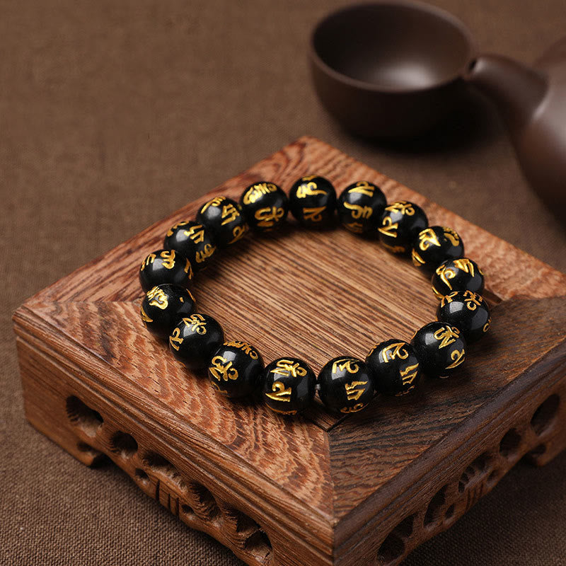 Pulsera de meditación Om Mani Padme Hum de ónix negro y cristal blanco del Tíbet con Buddha Stones