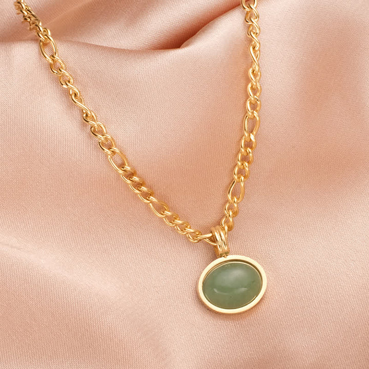 Colgante de collar de acero de titanio de fuerza turquesa ovalada