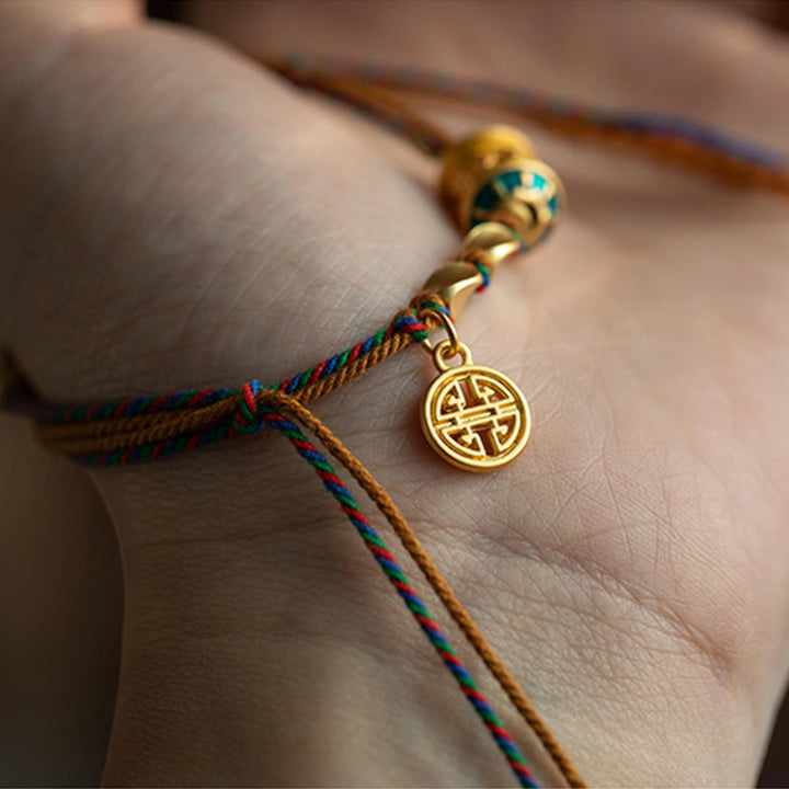 Pulsera de cuerda de fuerza de protección de rueda de oración Om Mani Padme Hum hecha a mano tibetana con Buddha Stones