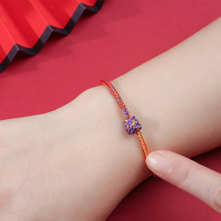 Pulsera de cuerda trenzada roja de oro púrpura colorida hecha a mano con Buddha Stones