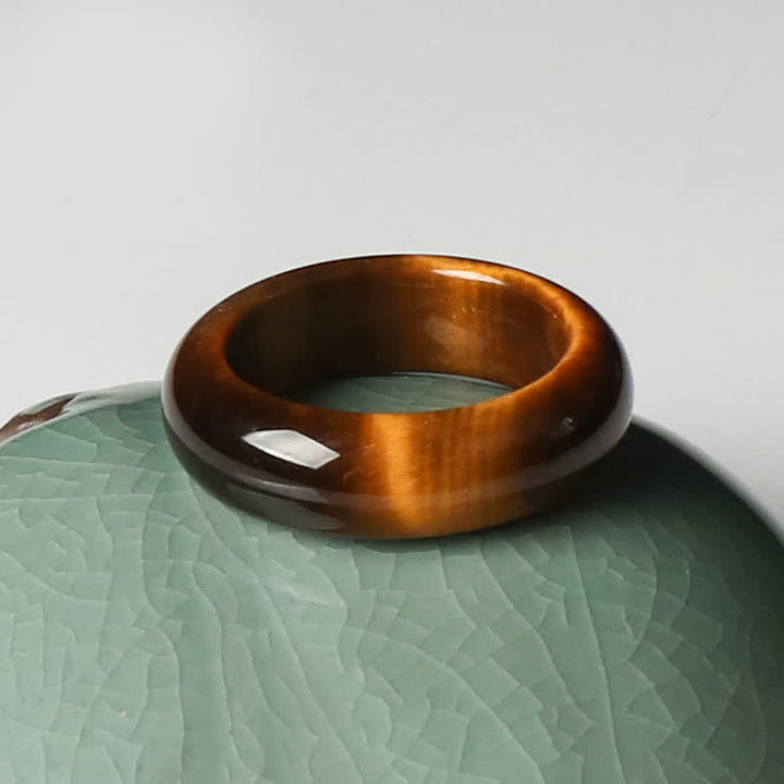 Anillo de protección de fuerza de piedra de ojo de tigre de Buddha Stones