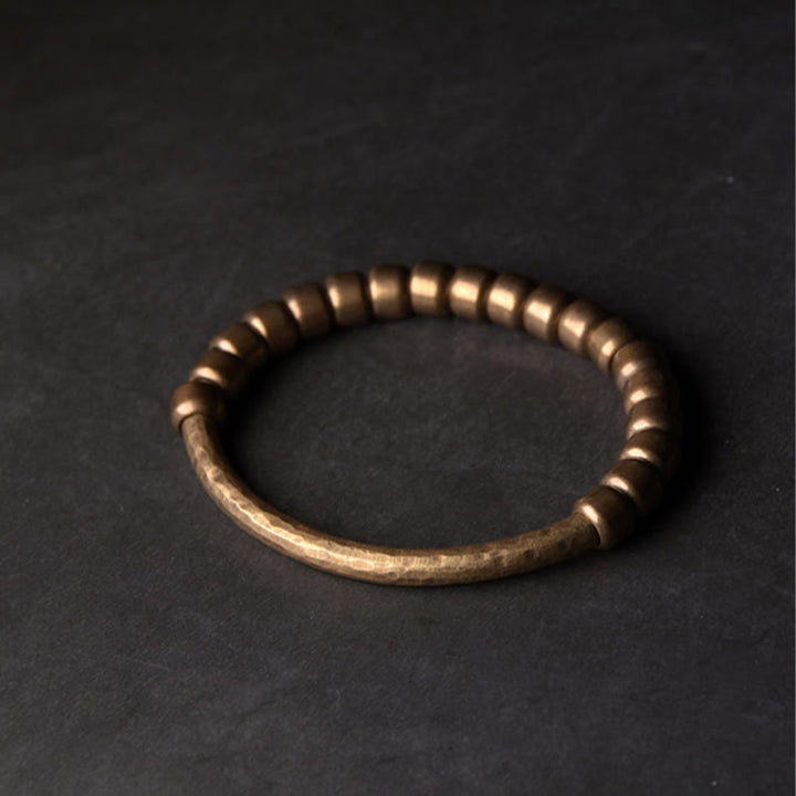 Pulsera de la riqueza de la suerte con cuentas de cobre y latón de diseño simple de Buddha Stones