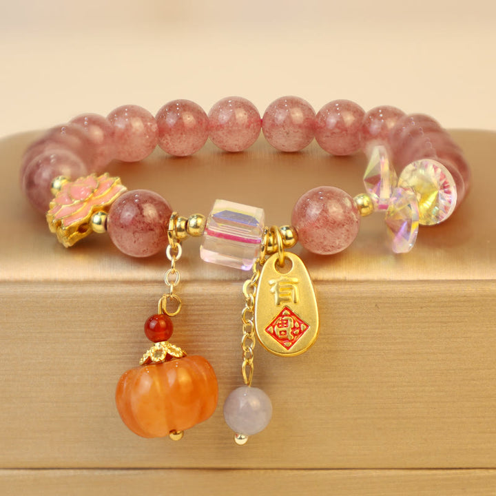 Pulsera positiva con dije de calabaza con personaje Fu de cuarzo fresa natural con Buddha Stones