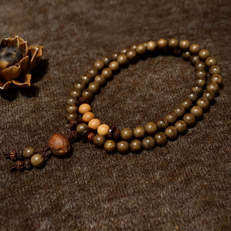 Pulsera Mala con dije de protección de sándalo tibetano - image 1