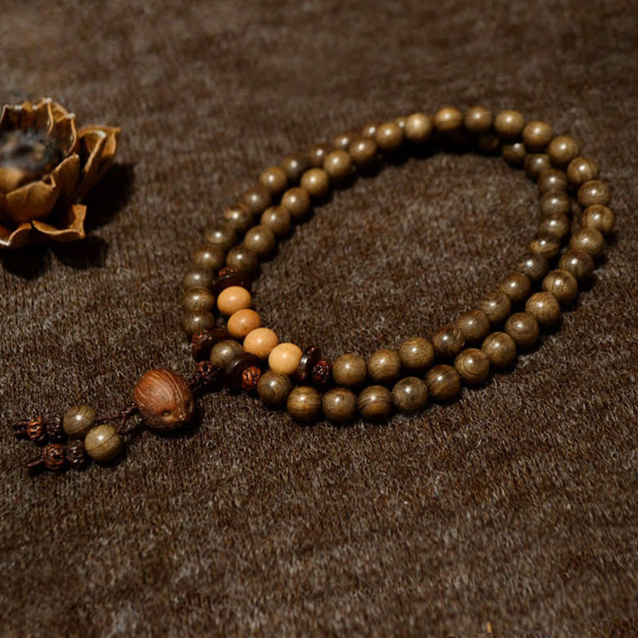 Pulsera Mala con dije de protección de sándalo tibetano - image 1