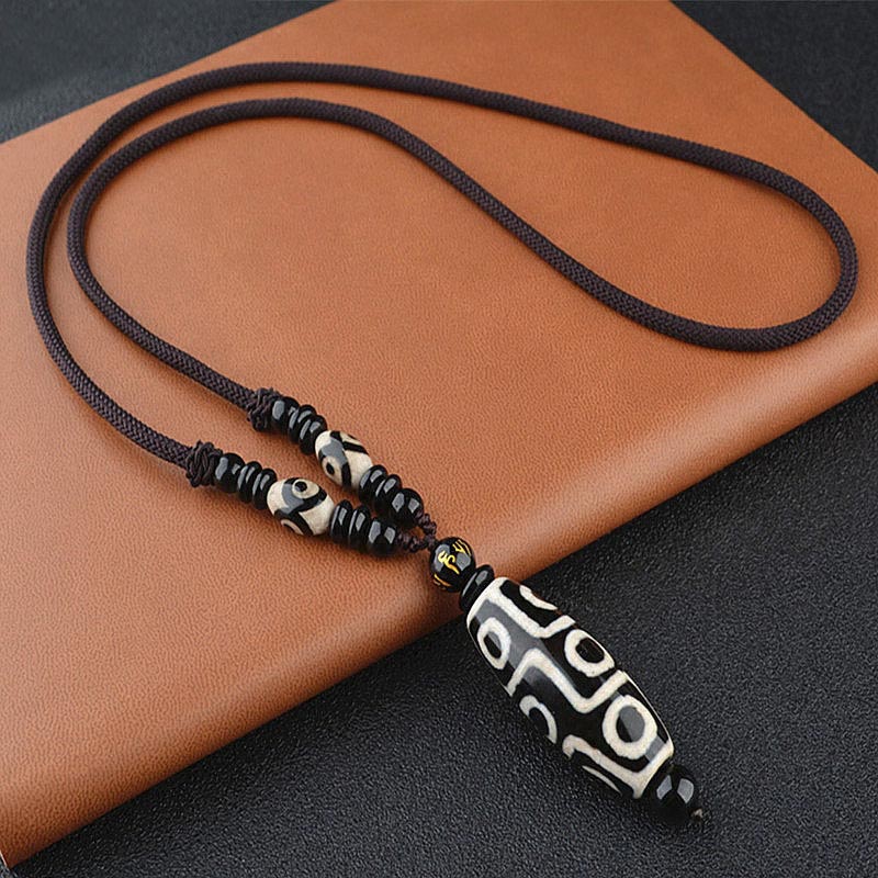 Collar de protección de la riqueza con cuentas Dzi de nueve ojos y Buddha Stones