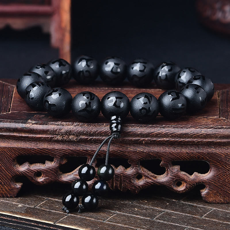 Pulsera de meditación Om Mani Padme Hum de ónix negro y cristal blanco del Tíbet con Buddha Stones
