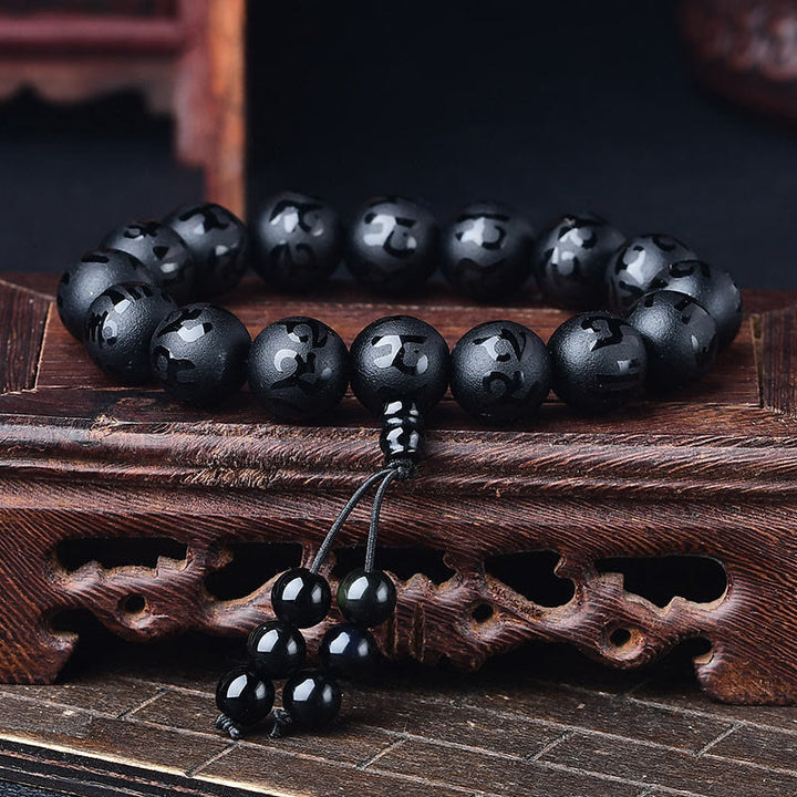 Pulsera de meditación Om Mani Padme Hum de ónix negro y cristal blanco del Tíbet con Buddha Stones