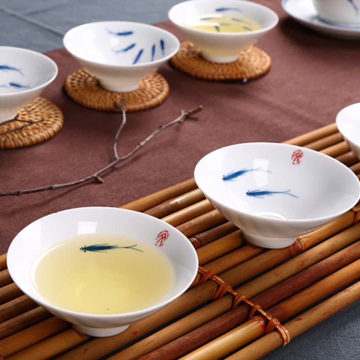 Buddha Stones Jingdezhen, porcelana azul y blanca, pez Koi, taza de té de cerámica, tazas de té de Kung Fu