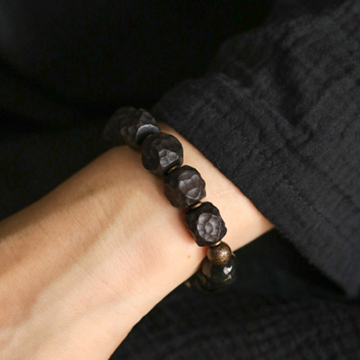 Pulsera de pareja de fuerza de cobre de madera de ébano de obsidiana negra con Buddha Stones