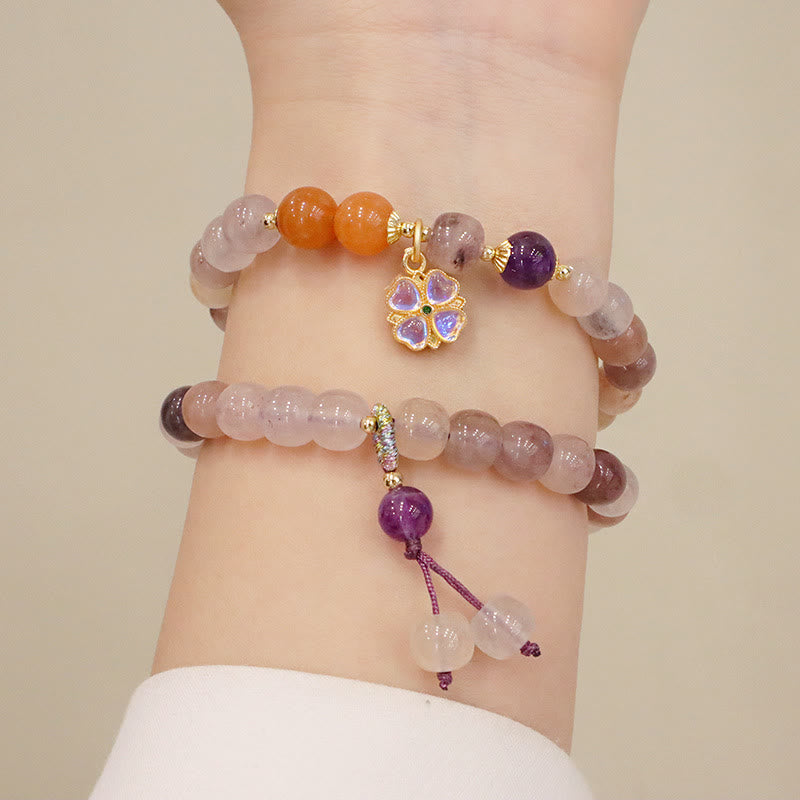 Pulsera de la riqueza del encanto del grano de la flor violeta del jade de la seda dorada púrpura natural de las Buddha Stones