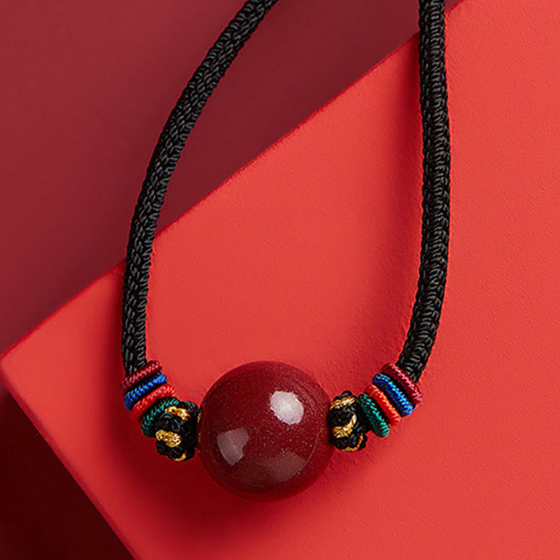 Collar con colgante de cadena con cuentas de cinabrio y Buddha Stones