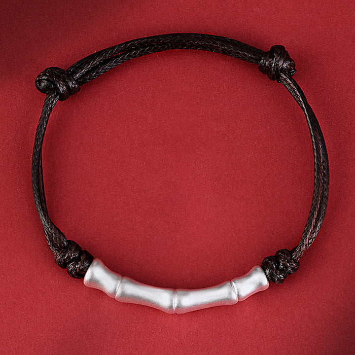 Pulsera trenzada de cuerda de la suerte con patrón de hueso de plata de ley 999 con Buddha Stones