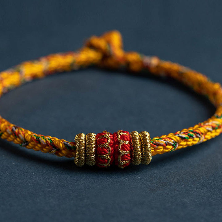 Pulsera de cuerda trenzada de fuerza de la suerte del Buda Natal del zodíaco chino hecha a mano del Tíbet con Buddha Stones