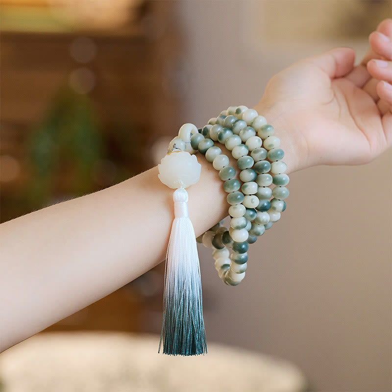 Buddha Stones Natural 108 cuentas Mala semilla Bodhi loto grabado sabiduría borla pulsera