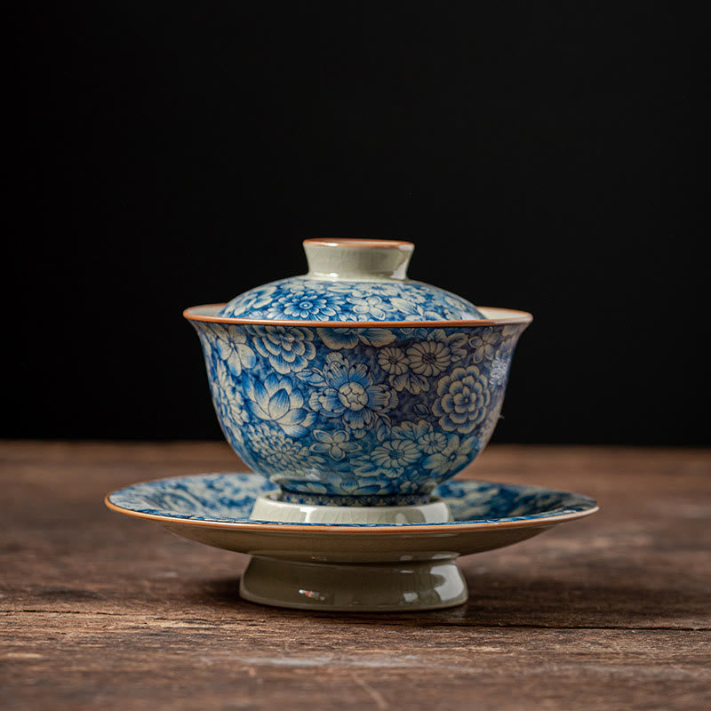 Buddha Stones azul y blanca vintage Flor de durazno Loto Peonía Cerámica Gaiwan Sancai Taza de té Kung Fu Taza de té y platillo con tapa - image 1