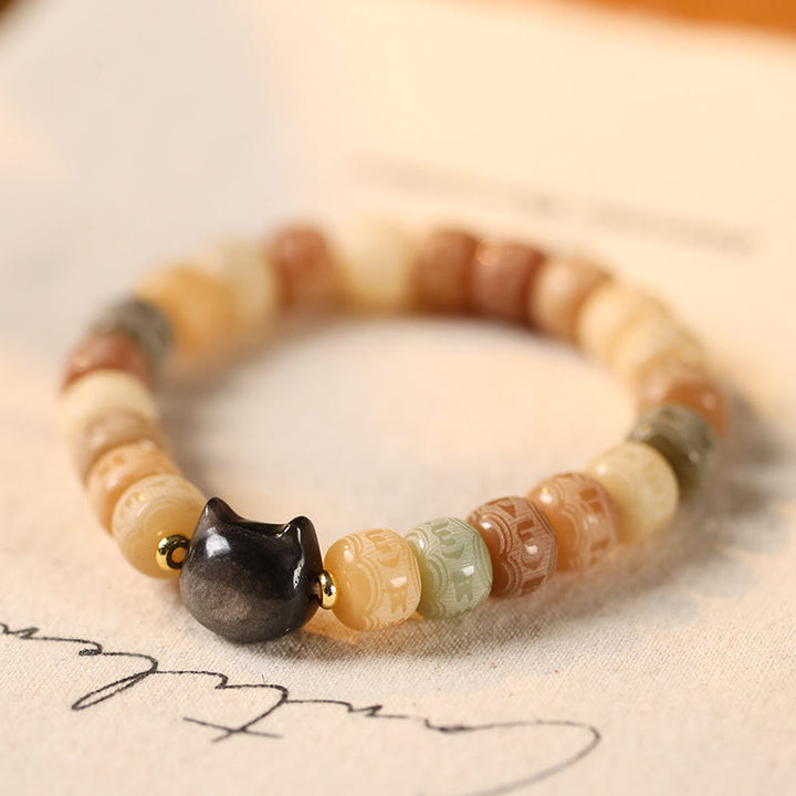 Pulsera de armonía grabada con Buddha Stones de Bodhi, brillo plateado, obsidiana, cabeza de gato, Om Mani Padme Hum - Semilla de Bodhi amarilla (circunferencia de la muñeca: 14-16 cm) - image 1