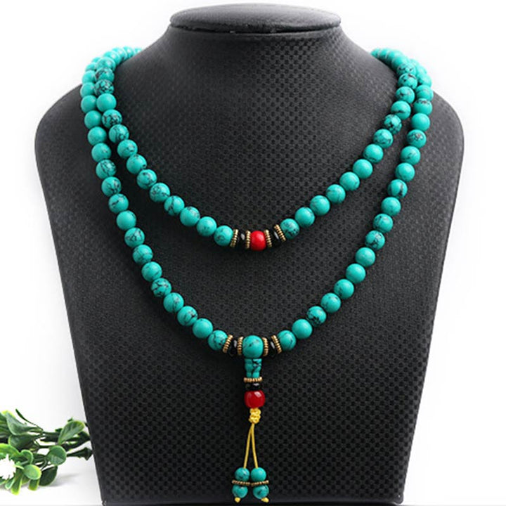 Pulsera Mala curativa de turquesa tibetana con Buddha Stones