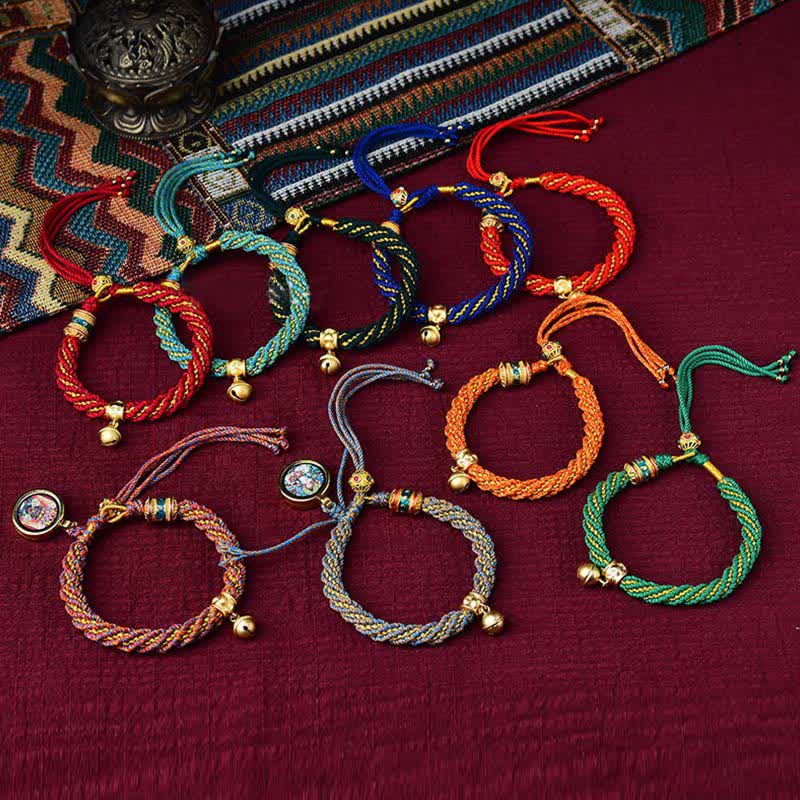 Pulsera de cuerda trenzada con dije de campana y rueda de oración Thangka de protección de la suerte hecha a mano tibetana
