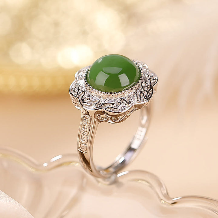 Anillo ajustable de la suerte con diseño de flor de jade cian hetiano de plata de ley 925 con Buddha Stones