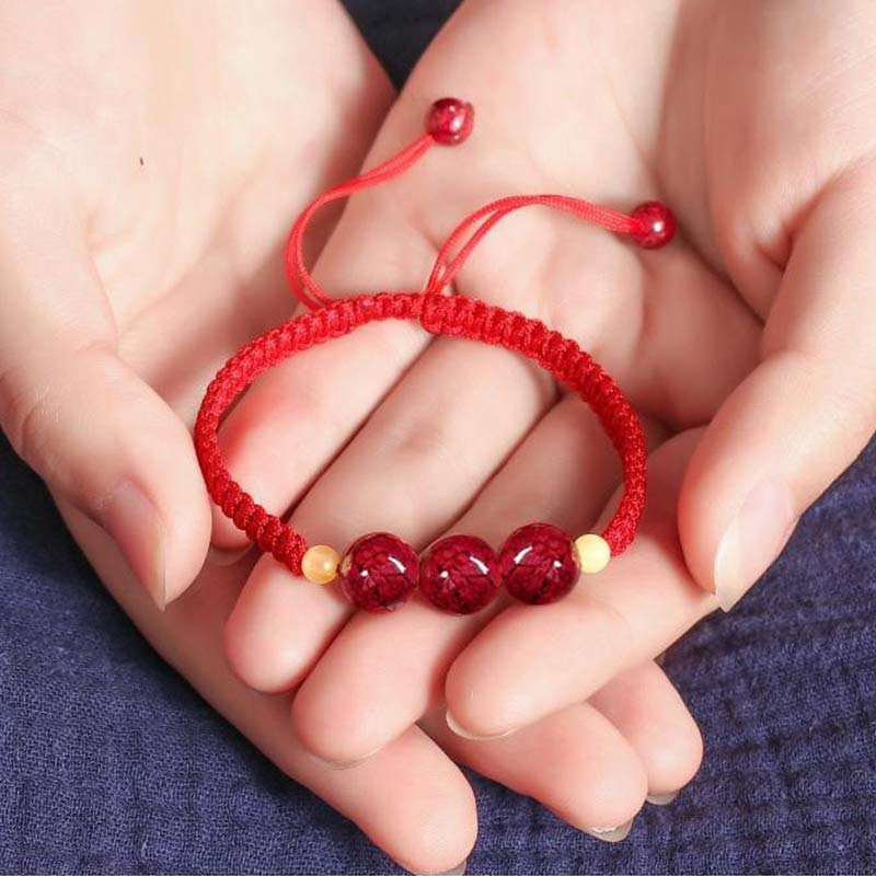 Pulsera de hilo rojo con bendición de cinabrio de Buddha Stones para niños
