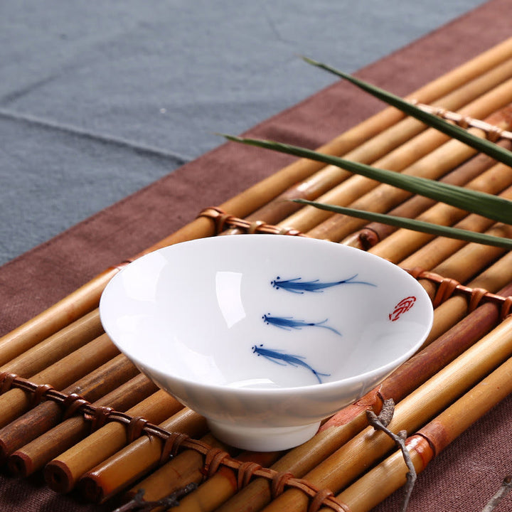 Buddha Stones Jingdezhen, porcelana azul y blanca, pez Koi, taza de té de cerámica, tazas de té de Kung Fu