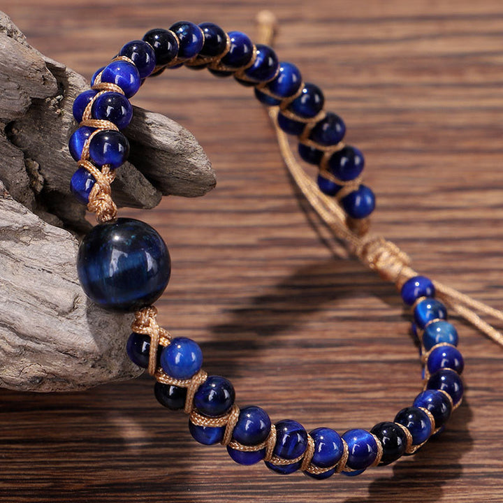 Pulsera de protección con piedra de ojo de tigre azul divino de Buddha Stones