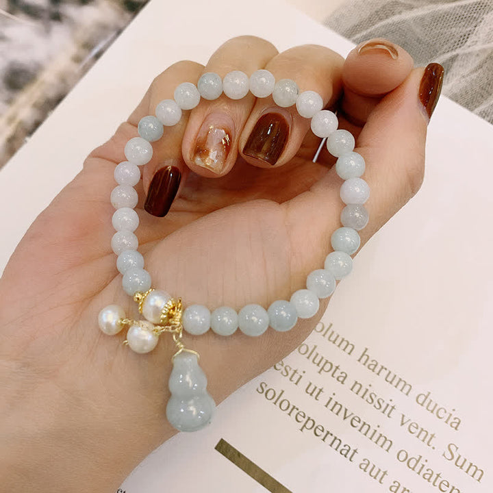 Pulsera de la suerte de la prosperidad de la calabaza de la perla del jade natural de las Buddha Stones