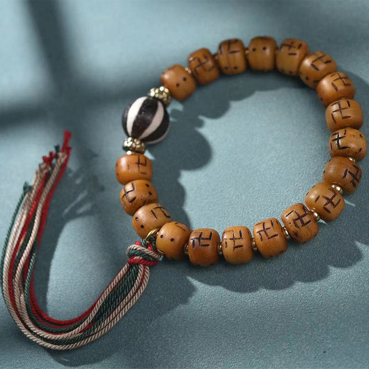 Buddha Stones, hueso de camello tibetano Natural, esvástica, cuentas Dzi, amuleto de Buda Shankha, Kirtimukha, pulsera con borla de protección de la suerte
