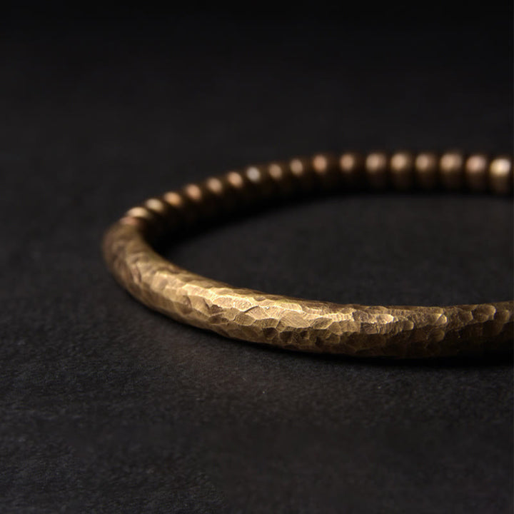 Pulsera de la riqueza de la suerte con cuentas de cobre y latón de diseño simple de Buddha Stones
