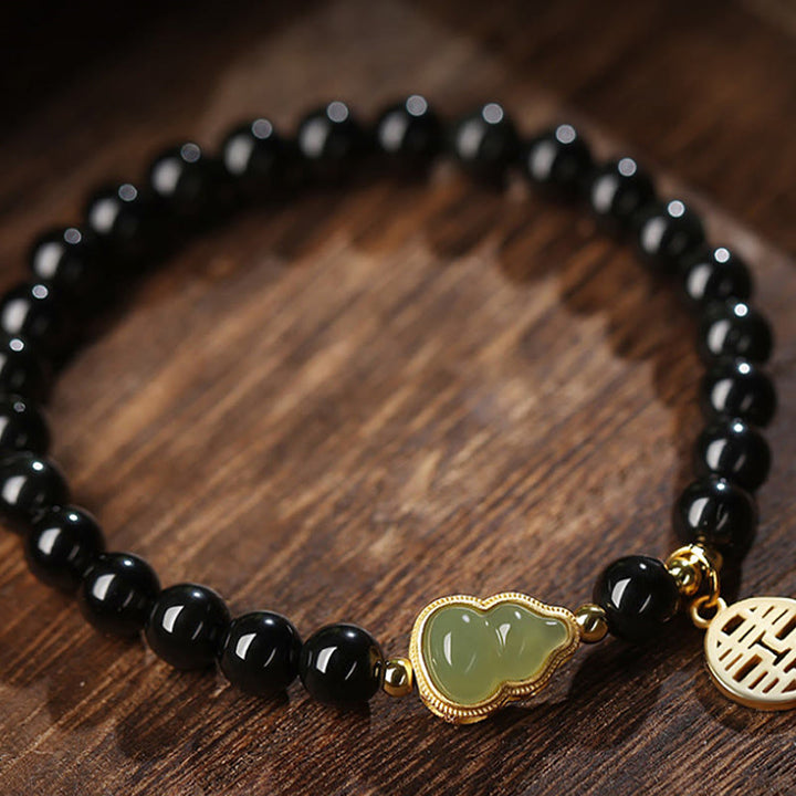Pulsera de fuerza de doble felicidad con calabaza de jade hetiano de obsidiana negra natural