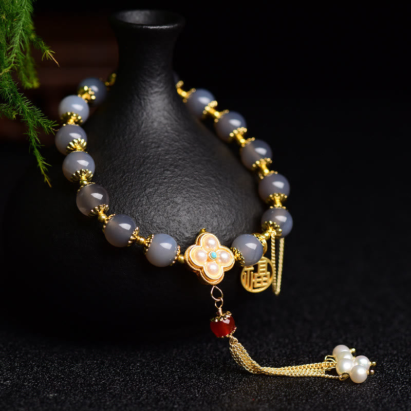 Pulsera de equilibrio con borlas y perlas de carácter Fu de ágata gris natural con Buddha Stones