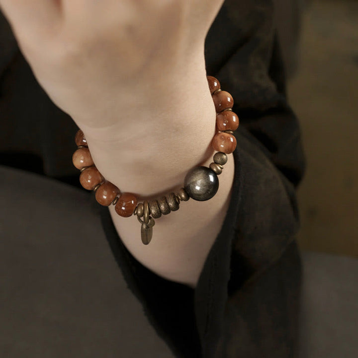 Buddha Stones con semillas de Kuka, ojo de tigre, obsidiana dorada, latón y cobre para la riqueza y la suerte. - image 12