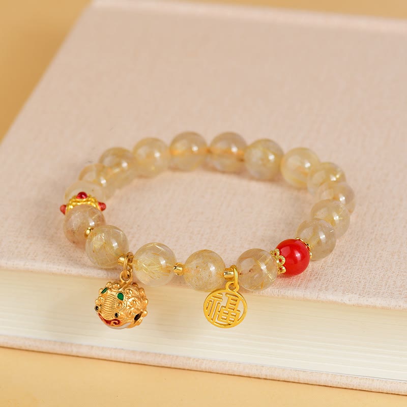 Pulsera de riqueza de campana con dije de personaje Fu de cuarzo rutilado dorado natural con Buddha Stones