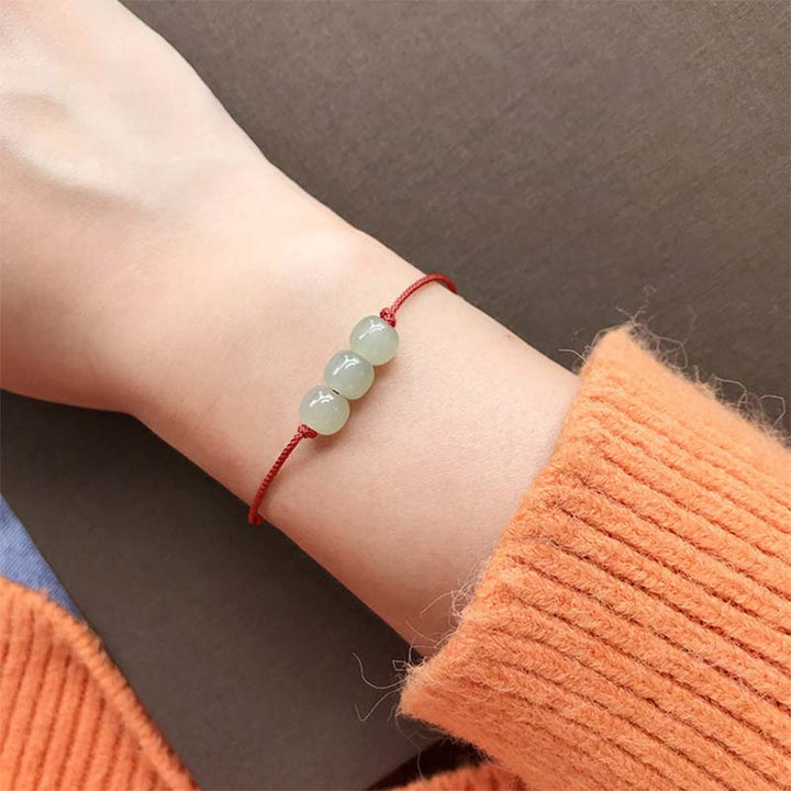 Pulsera de tejido de hilo de la suerte de jade con tres cuentas de piedras de Buddha Stones