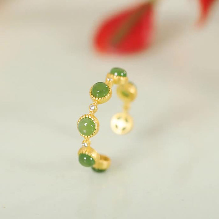 Anillo ajustable calmante curativo de jade cian con Buddha Stones