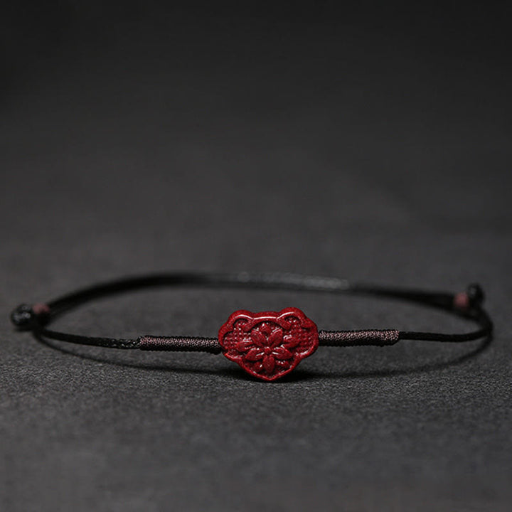 Pulsera trenzada hecha a mano con Buddha Stones, flor de ciruelo, trébol de cuatro hojas, PiXiu, loto, pez Koi, cinabrio