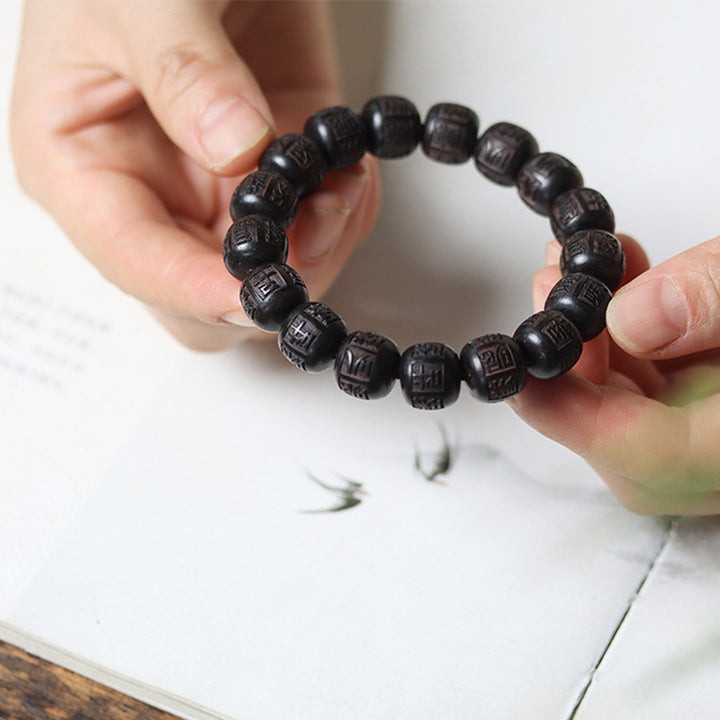 Pulsera de equilibrio grabada con Buddha Stones , madera de ébano del Tíbet, Om Mani Padme Hum