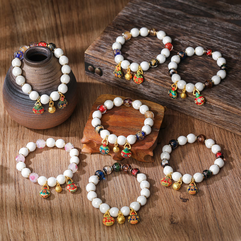 Pulsera de la suerte con cuentas de porcelana coloridas de cristal Liuli con Buddha Stones que tragan oro y bestia familiar