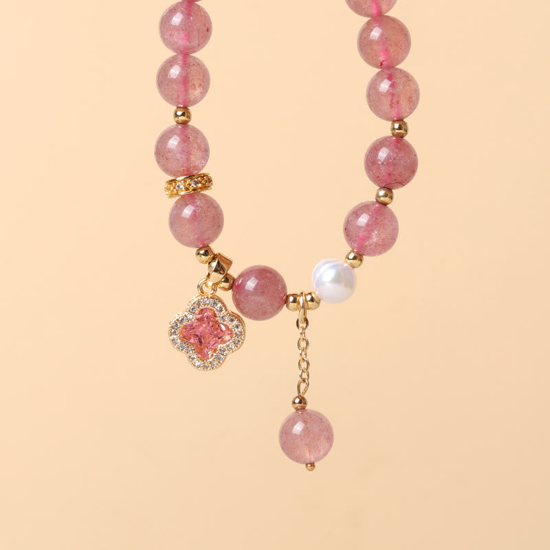 Pulsera curativa con dije de trébol de cuatro hojas y perlas de cuarzo fresa con Buddha Stones