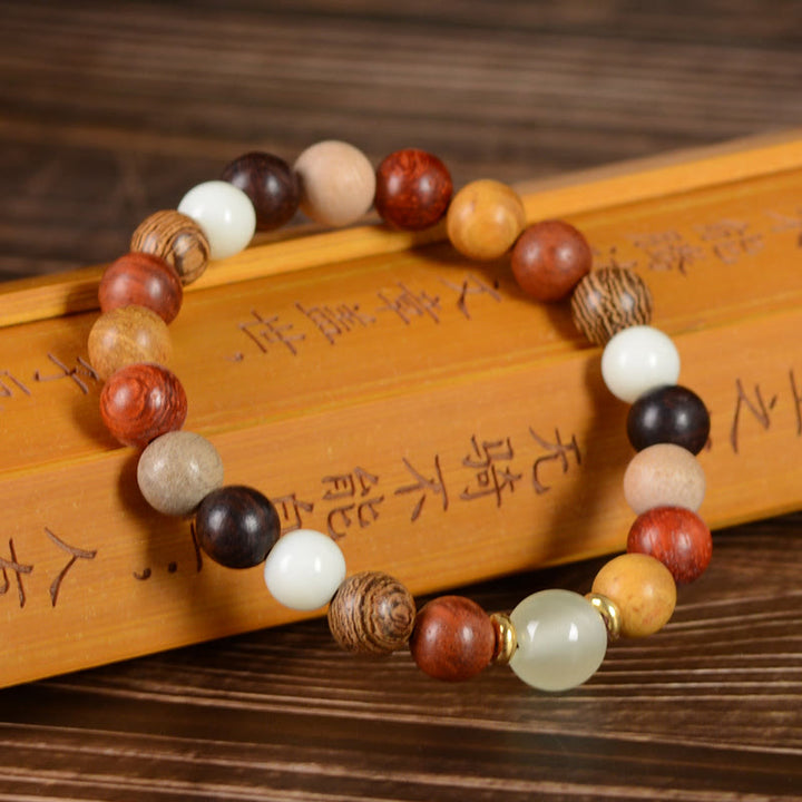 Pulsera de la paz de sándalo rojo de madera de ébano de sándalo verde multicolor con Buddha Stones